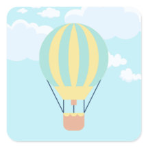 Green and Yellow Hot air balloon in the Sky 