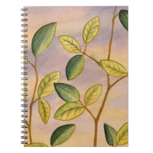 Green and Yellow Leaves on Sunset Background Notebook