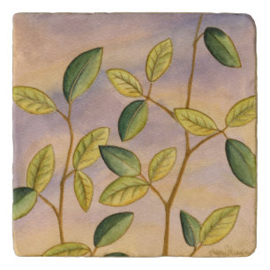 Green and Yellow Leaves on Sunset Background Trivet