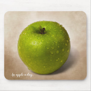 Green apple and a custom text mouse pad