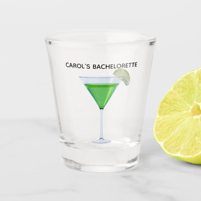 Green appletini cocktail with slice of apple shot glass (Front)