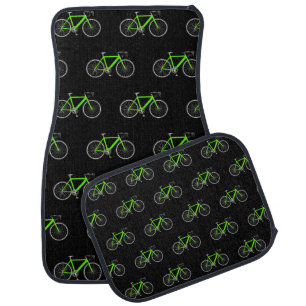 Green Bicycles On Black Car Floor Mat