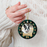 Green Buffalo Plaid Pattern Gold Bow Family Photo Ceramic Ornament<br><div class="desc">Add a cozy and warm charm to your Christmas tree with our Pet photo ornament featuring a cozy and warm green buffalo plaid pattern background. Circle photo frame with a festive faux gold bow and bone. Customize with your pets name & photo. Designed by Moodthology Papery</div>