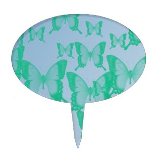 green butterflies in blue background
