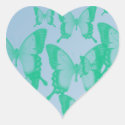 green butterflies in blue background heart sticker