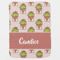 Green cactus plants on pink baby blanket