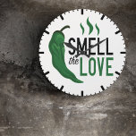 Green Chile Smell the Love Large Clock<br><div class="desc">There is just not much in this world that smells better than green chile peppers roasting or red chile pork cooking in the oven. For those of us who grew up with chile, it's the smell of love and home. Show your love with this design feature a pepper and text....</div>