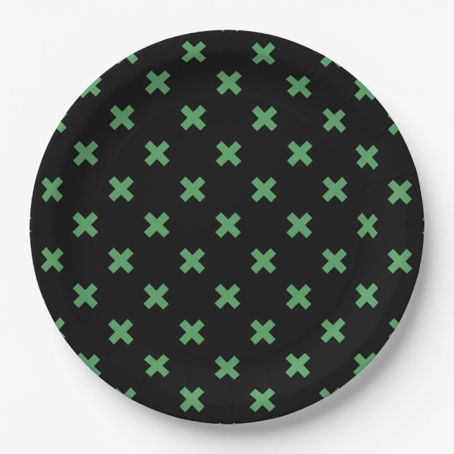Green cross stitches on black paper plates (Front)