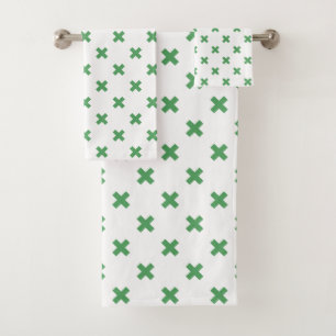 Green cross stitches on white bath towel set