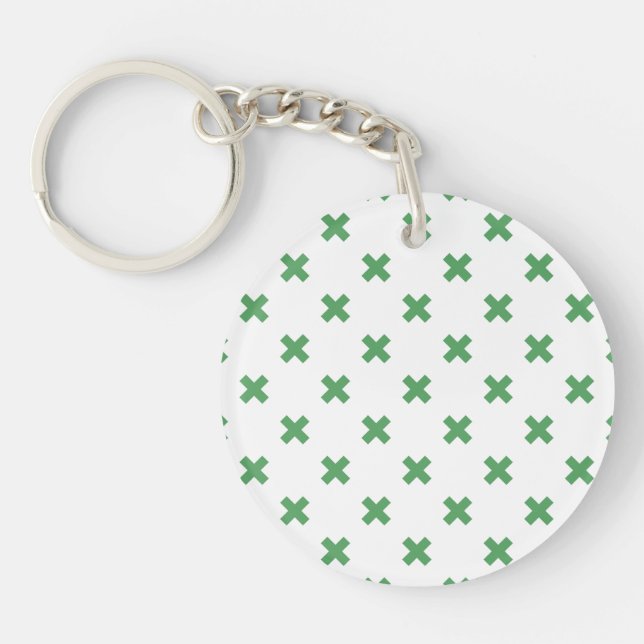 Green cross stitches on white keychain (Front)