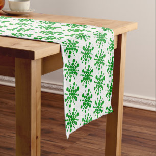Green dotted stars on white short table runner