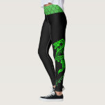 Green Dragon Leggings<br><div class="desc">Show your fierce side in exercise, kick boxing, yoga or running around in this cool pair of black leggings. Graphics of a green Chinese style dragon decorates the outside of both legs, with custom green text reading Fierce. A green scale pattern accent band, runs across the top of the leggings....</div>