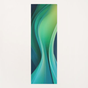 Green flowing forms on dark blue yoga mat