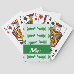 Green flying airplanes on blue poker cards