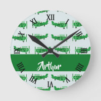 Green flying airplanes on blue round clock