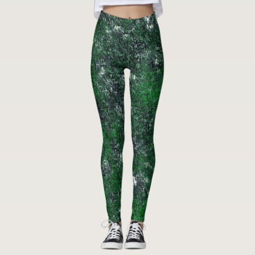 Green fungus upon whitish gray rock or tree trunk  leggings