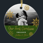 Green Gold Snowflakes First Christmas Engaged Ceramic Ornament<br><div class="desc">Bright Christmas holiday photo ornament with gold snowflakes and bright green background for engaged couple. Personalize it by adding your names. It's a good gift for newly weds or for a fiance/fiiancee.</div>