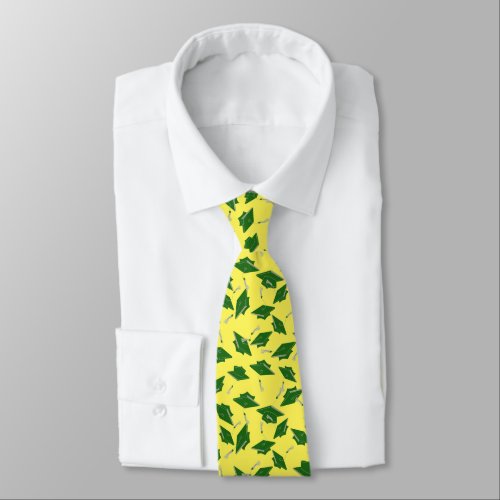 Green Graduation Caps Tossed in the Air on Yellow Neck Tie