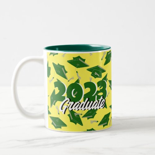 Green Graduation Caps Tossed in the Air on Yellow Two_Tone Coffee Mug