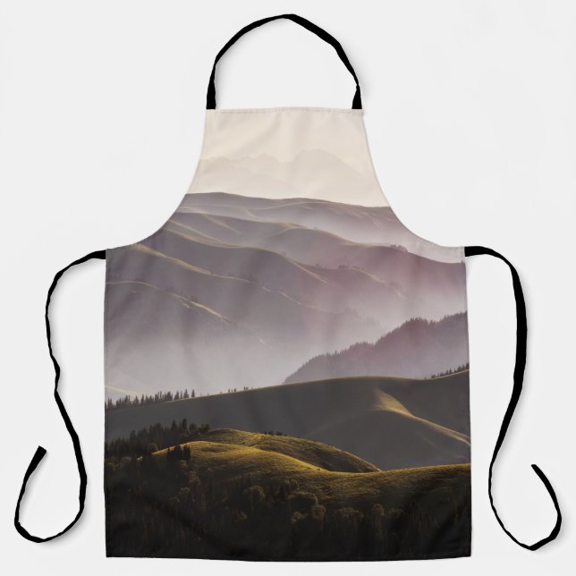 GREEN GRASS FIELD AND MOUNTAINS DURING DAYTIME APRON (Front)