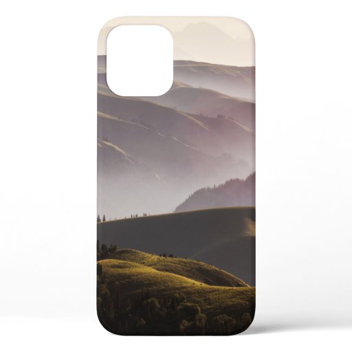 GREEN GRASS FIELD AND MOUNTAINS DURING DAYTIME iPhone 12 CASE