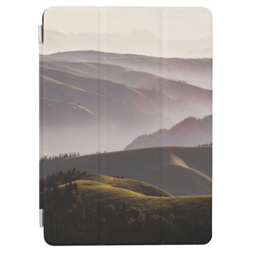 GREEN GRASS FIELD AND MOUNTAINS DURING DAYTIME iPad AIR COVER