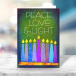 Green Hanukkah Boho Candles Peace Love Light Bold Holiday Card<br><div class="desc">“Peace, love & light.” A playful, modern, artsy illustration of boho pattern candles in a menorah helps you usher in the holiday of Hanukkah. Assorted blue candles with colorful faux foil patterns overlay a rich, deep green textured background. Feel the warmth and joy of the holiday season whenever you send...</div>