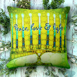 Green Hanukkah Menorah Peace Love Light Script Throw Pillow<br><div class="desc">“Peace, love & light.” A close-up photo of a bright, colorful, green and yellow artsy menorah helps you usher in the holiday of Hanukkah in style. Feel the warmth and joy of the holiday season whenever you relax on this stunning, colorful Hanukkah throw pillow. Makes a striking set of four...</div>