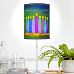 Green Hanukkah Peace Love Light Boho Candles Bold Table Lamp<br><div class="desc">“Peace, love & light.” A playful, modern, artsy illustration of boho pattern candles in a menorah helps you usher in the holiday of Hanukkah. Assorted blue candles with colorful faux foil patterns overlay a rich, deep green textured background. Feel the warmth and joy of the holiday season whenever you use...</div>