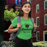 Green High School Graduate Personalized Graduation T-Shirt<br><div class="desc">This kelly green custom senior graduate t-shirt features classy white typography of your high school or college name for the class of 2024. Customize with your graduating year under the chic black handwritten script and black grad cap for a great personalized light green graduation tee for a party or keepsake...</div>