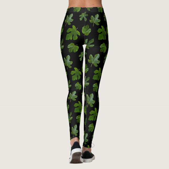 Green leaf closeup isolated on black background leggings (Back)