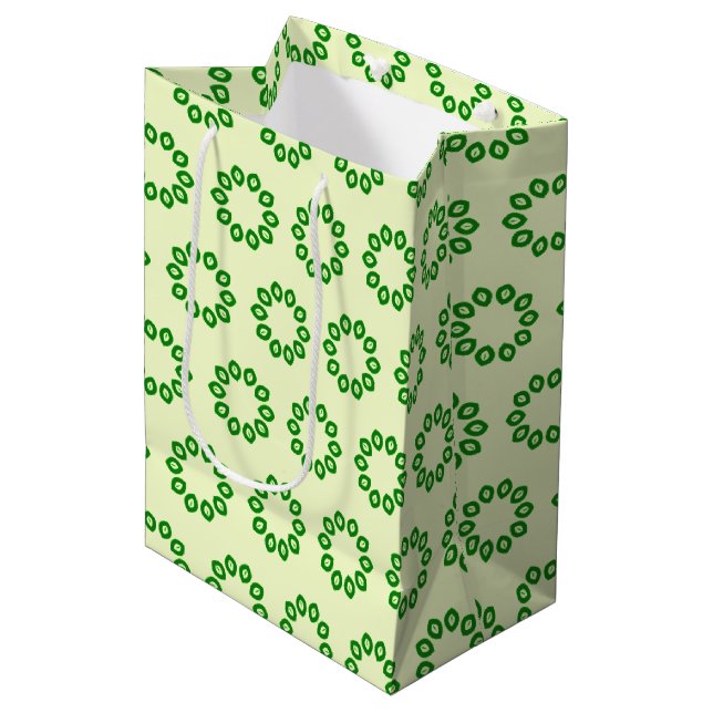 Green leaves in a circle on yellow  medium gift bag (Front Angled)