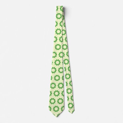 Green leaves in a circle on yellow  neck tie