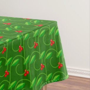 Green Leaves with Little Red Wild Berries on Green Tablecloth