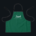 Green Little Chef Script Name personalized Kids Apron<br><div class="desc">Make your little chef feel extra special with our Green Little Chef Script Name Personalized Kids Apron. This apron is designed to provide a simple, chic, and elegant look, featuring stylish script typography for personalizing the name. The purple background color adds a touch of vibrancy and fun, perfect for engaging...</div>