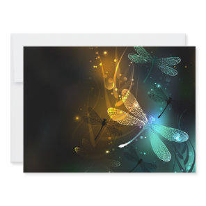 Green luminous dragonfly flight