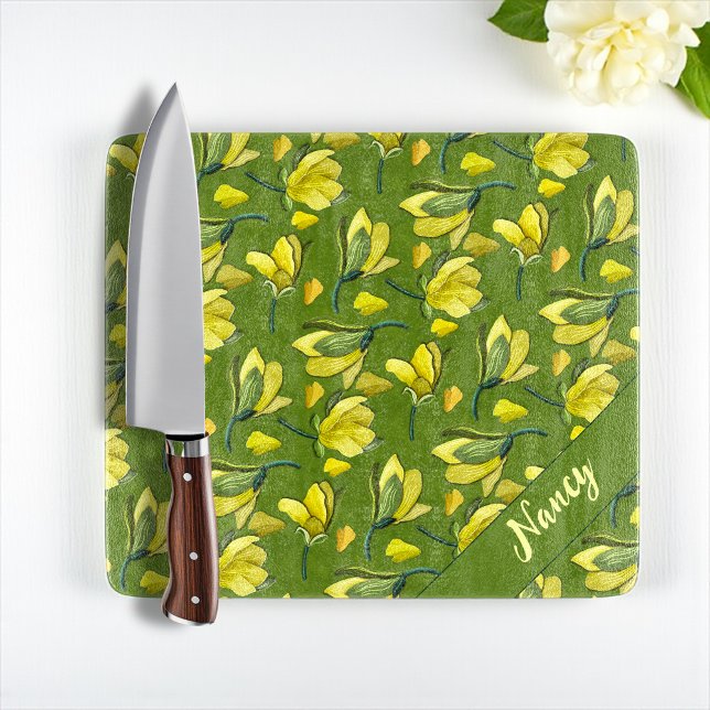 Green Magnolia Floral Personalized  Cutting Board (Elegant glass cutting board with yellow magnolias, green background, and personalized name.)