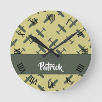 Green military airplane on brown round clock