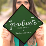 Green Modern Simple Chic Elegant Script Heart Name Graduation Cap Topper<br><div class="desc">Your favorite grad will stand out and make a statement when they wear this graduation cap topper! Let them celebrate their milestone with this girly, stunning, simple, modern, custom graduation keepsake. A fun, playful visual of white script handwriting and cute, playful hearts, along with her name and class year, overlay...</div>