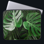 Green monstera leaves and palm leaves laptop sleeve<br><div class="desc">Green monstera leaves and palm leaves</div>