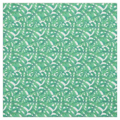 Green monstera tropical leaves pattern  on white b fabric