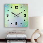 Green ombre watercolor gold confetti dots chic square wall clock<br><div class="desc">Bold, black easy-to-read numerals and rich champagne faux gold foil confetti dots overlay a chic, pastel turquoise blue, green and purple watercolor ombre background. Enliven up your favorite room with this stylish, modern, simple and chic wall clock. Your choice of a round or square clock face. Makes a wonderful statement...</div>