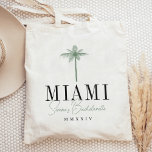 Green Palm Tree Personalized Bachelorette Party Tote Bag<br><div class="desc">Welcome friends to your bachelorette weekend with these cute personalized tote bags. Perfect for beachy or tropical locales, this design features a green palm tree silhouette illustration with your destination beneath (shown with Miami) in classic serif lettering. Add your name(s) or occasion name beneath in handwritten cursive script, as well...</div>