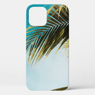 Green palm tree under blue sky iPhone 12 case