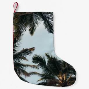 Green palm tree under white sky in the morning small christmas stocking