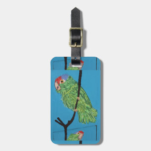 green parrot on blue luggage tag