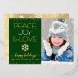 Green Peace Joy Love Photo Snowflakes Real Gold Foil Holiday Card<br><div class="desc">“Peace, joy & love.” A fun, playful, real gold foil and white snowflake illustration, real gold foil confetti dots, and real gold foil and white modern typography on a hunter green background, along with the custom photo of your choice, help you usher in the holiday season. A random white snowflake...</div>