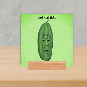 Green Pickle With Face Big Eyes on Light Green Holder