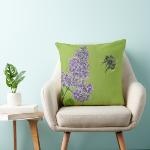 Green pillow with lilac and bumblebee