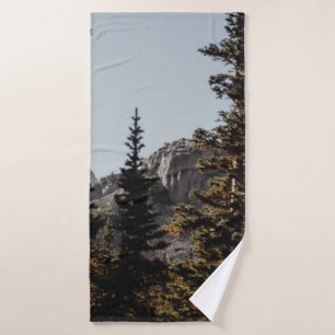 GREEN PINE TREES NEAR MOUNTAIN DURING DAYTIME BATH TOWEL